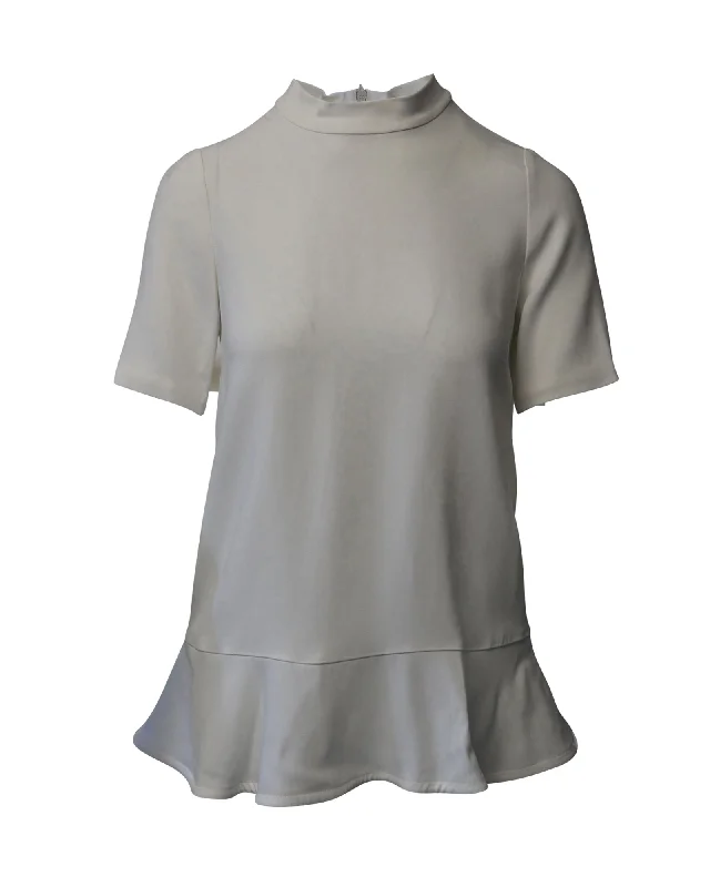 Asymmetrical ShirtsStella McCartney Mock Neck Peplum Blouse in White Rayon